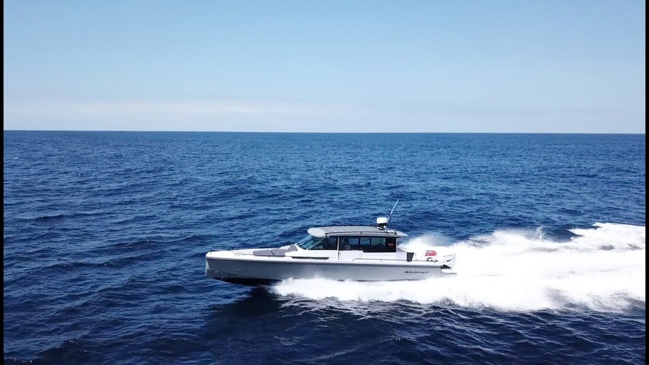 AXOPAR-28-T-TOP-and-37-SPORTS-CABIN-58-kts-Dolphins-Pittwater-to-Sydney-Harbour