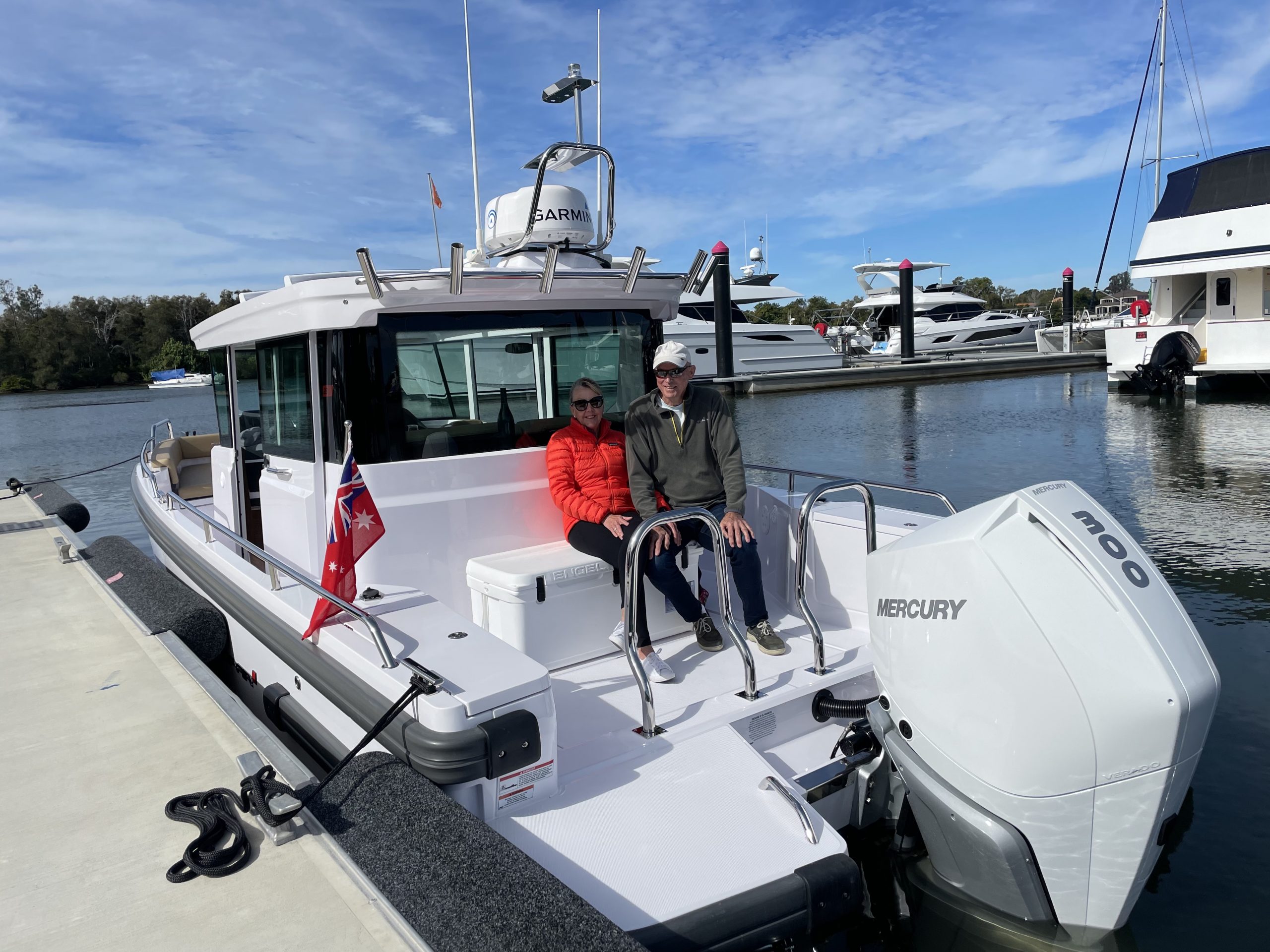 Axopar 28 customers sitting on their new boat