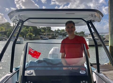 Customer driving his new Axopar boat